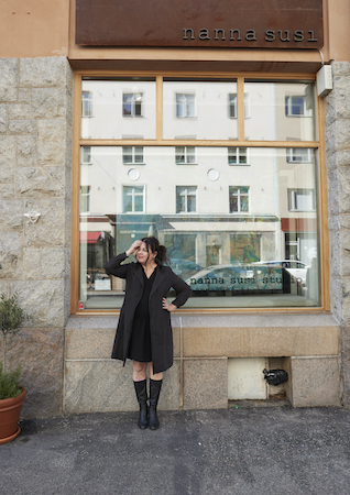 Nanna Susi in front of her studio